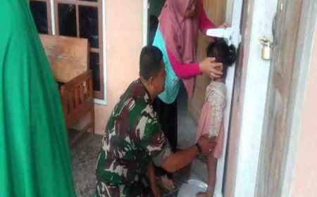 Wujudkan Balita Sehat, Babinsa Koramil 11/Punggelan Aktif Dampingi Petugas Posyandu