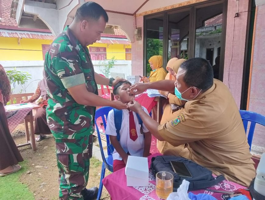 Peduli Kesehatan Babinsa Dampingi Kegiatan Sub Pin Polio di Desa Binaan. 
